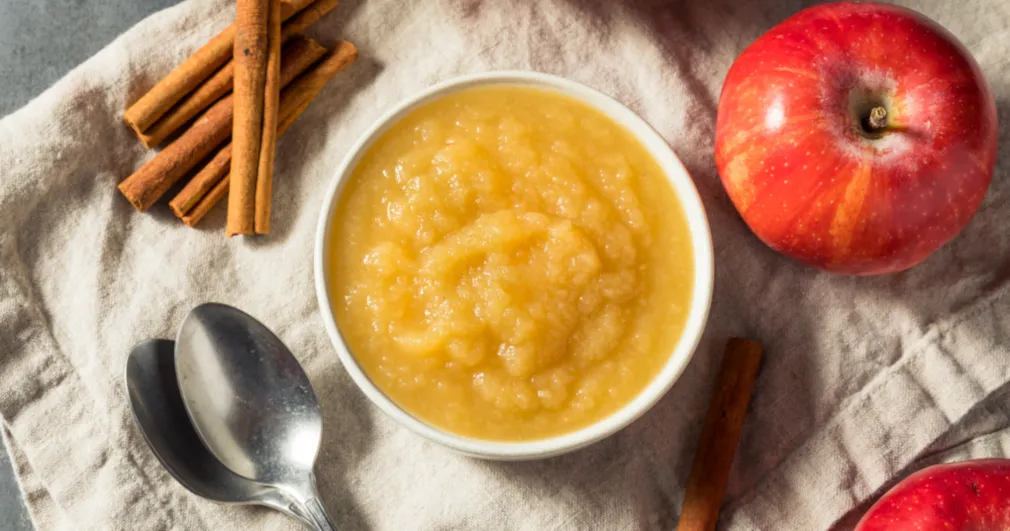 Homemade applesauce in a bowl with cinnamon - nutritious and delicious fall treat