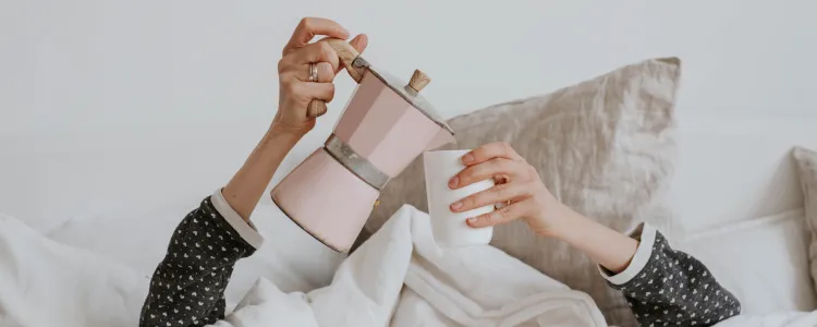 Cup of black coffee with minimal milk showing fasting-friendly beverage that maintains ketosis during intermittent fasting