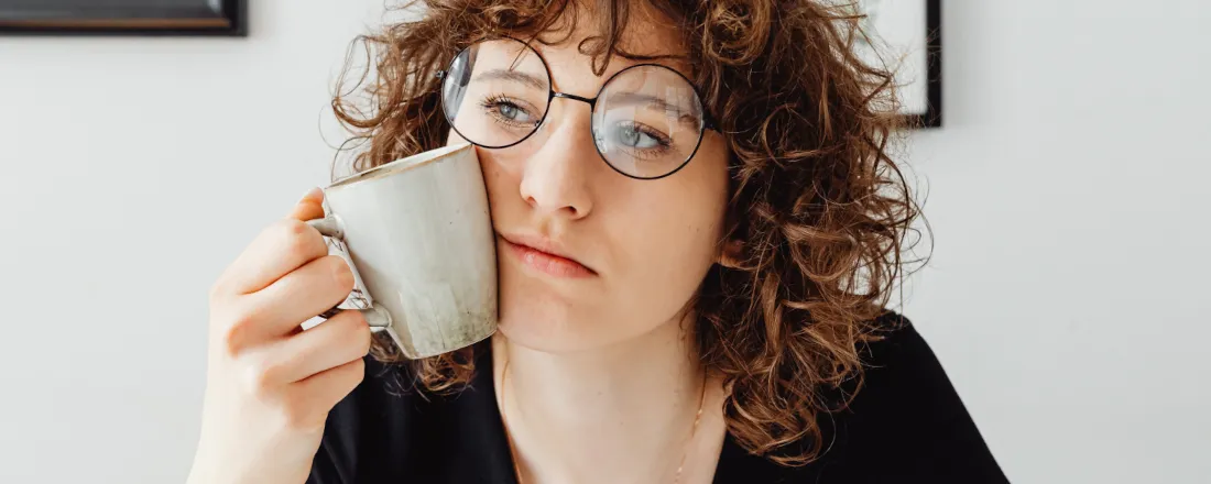 Person contemplating different intermittent fasting methods including 5:2 diet options and alternatives