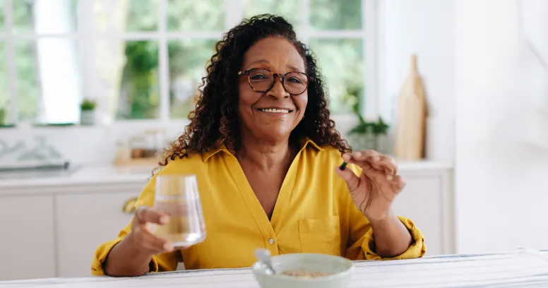 Senior adult enjoying healthy nutritious breakfast meal while learning about intermittent fasting safety for older adults