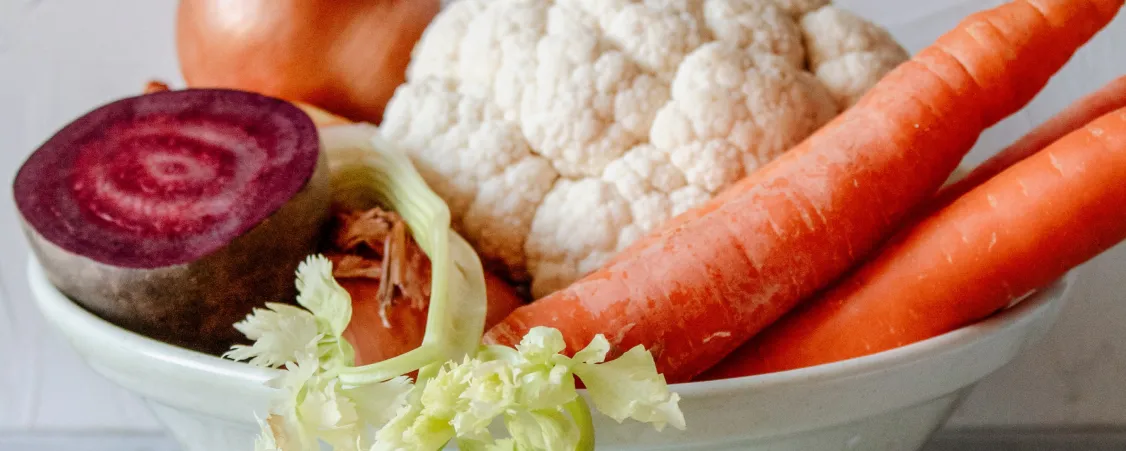 Healthy nutrient-dense vegetables including carrots cauliflower and beets for safe intermittent fasting meal planning