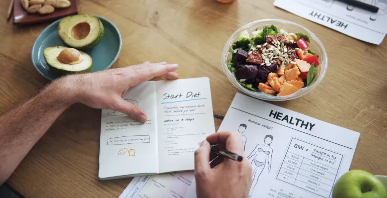 Meal planning guide showing protein-rich foods healthy fats and fiber sources for low-carb intermittent fasting diet
