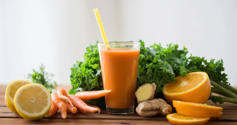 Woman enjoying healthy beverage demonstrating flexible intermittent fasting timing versus traditional diet restrictions